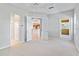 Spacious bedroom with access to bathroom and patio at 134 Savona Way, North Venice, FL 34275