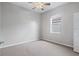 Bright bedroom with carpeted floor and neutral walls at 134 Savona Way, North Venice, FL 34275