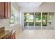 Kitchen with view to screened porch and golf course at 134 Savona Way, North Venice, FL 34275