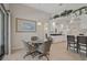 Bright dining area with wicker chairs and a glass-top table at 19267 Kirella St, Venice, FL 34293