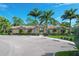 Community pool with palm trees and parking at 19348 Yellowtail Ct, Venice, FL 34292
