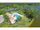 Enjoy this community pool with lake views at 19348 Yellowtail Ct, Venice, FL 34292