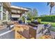 Large deck with multiple seating areas and backyard access at 19348 Yellowtail Ct, Venice, FL 34292