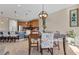Open concept dining area adjacent to kitchen and living areas at 19348 Yellowtail Ct, Venice, FL 34292