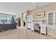 Open concept living space with built-in workspace and a Christmas tree at 19348 Yellowtail Ct, Venice, FL 34292