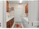 Laundry room with washer, dryer, and cabinets at 19397 Rizzuto St, Venice, FL 34293