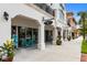 Quaint storefronts showcasing boutique shops and outdoor seating areas at 200 Park N Blvd # 104, Venice, FL 34285