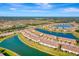 Expansive aerial view of the community and surrounding landscape at 20428 Lagente Cir, Venice, FL 34293