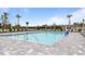 Inviting community pool with plenty of lounge chairs at 2145 Bonito Way, Port Charlotte, FL 33953