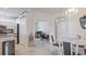 Kitchen with granite countertops and view into home office at 2145 Bonito Way, Port Charlotte, FL 33953