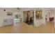 Open kitchen with stainless steel appliances and island at 225 Firenze W Ave, Venice, FL 34285
