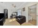 Home office with built-in desk and adjacent bathroom at 225 Firenze W Ave, Venice, FL 34285