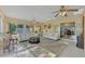 Sunroom with tiled floor and access to backyard at 225 Firenze W Ave, Venice, FL 34285