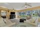 Sunroom with comfortable seating and backyard access at 225 Firenze W Ave, Venice, FL 34285