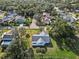 Aerial view of single-Gathering home with large backyard and pond at 2281 Mars Rd, Venice, FL 34293