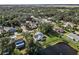 Aerial view showing home's location in a residential neighborhood near water at 2281 Mars Rd, Venice, FL 34293