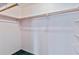 Good sized closet with shelves and hanging rod at 2281 Mars Rd, Venice, FL 34293
