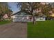 Ranch-style home with a spacious yard and driveway at 2281 Mars Rd, Venice, FL 34293