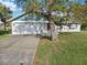 House exterior with driveway and landscaping at 2281 Mars Rd, Venice, FL 34293