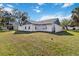 House exterior showcasing a side view and landscaping at 2281 Mars Rd, Venice, FL 34293