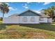 House exterior showcasing a side view and landscaping at 2281 Mars Rd, Venice, FL 34293