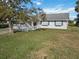 House exterior showcasing front yard and landscaping at 2281 Mars Rd, Venice, FL 34293