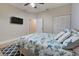 Bright bedroom with tiled floors and a built-in closet at 23102 Madelyn Ave, Port Charlotte, FL 33954