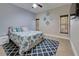 Bedroom with a queen-size bed and patterned rug at 23102 Madelyn Ave, Port Charlotte, FL 33954