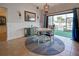 Casual dining area with sliding door access to screened patio at 23102 Madelyn Ave, Port Charlotte, FL 33954