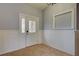 White wainscoting and tile floor entry at 23102 Madelyn Ave, Port Charlotte, FL 33954