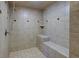 Large tiled shower with built-in bench and shower head at 23102 Madelyn Ave, Port Charlotte, FL 33954
