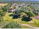 Aerial view of the home and surrounding golf course at 2331 Harrier Way, Nokomis, FL 34275