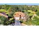Single-story house with tile roof and attached garage at 2331 Harrier Way, Nokomis, FL 34275