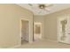 Spacious bedroom with access to another room and bathroom at 2331 Harrier Way, Nokomis, FL 34275