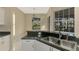 Kitchen with breakfast nook and view of backyard at 2331 Harrier Way, Nokomis, FL 34275
