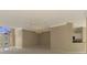 Open living room with high ceilings and neutral tones at 2331 Harrier Way, Nokomis, FL 34275