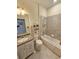 Well-lit bathroom with vanity, shower, and tub at 2501 Sherman Oak Dr, North Port, FL 34289