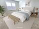 Bedroom with a window and a bench at 2501 Sherman Oak Dr, North Port, FL 34289