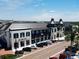 Striking commercial building, Villani & Co, featuring modern architecture and ample parking at 2501 Sherman Oak Dr, North Port, FL 34289