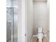 Small bathroom with toilet and shower at 2572 Daisy Dr, North Port, FL 34289