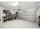 Spacious two-car garage with ample storage shelving at 2572 Daisy Dr, North Port, FL 34289