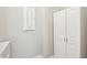 Laundry room with cabinets and a washer and dryer at 2572 Daisy Dr, North Port, FL 34289