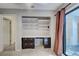 Office nook with custom built-in cabinetry and desk at 263 Southampton Dr # 301, Venice, FL 34293
