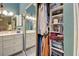 Well-organized closet with built-in shelving and ample hanging space at 263 Southampton Dr # 301, Venice, FL 34293