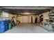 Garage with storage, appliances, and space for bikes at 263 Southampton Dr # 301, Venice, FL 34293