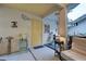 Whimsical patio area with artistic decorations and access to a room at 263 Southampton Dr # 301, Venice, FL 34293