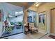 Tranquil patio space with comfortable seating, plants, and natural light at 263 Southampton Dr # 301, Venice, FL 34293