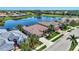 House with a tile roof, located in a golf course community at 2878 Egret Ct, North Port, FL 34287