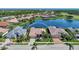 Property view showcasing home's location near water and golf course at 2878 Egret Ct, North Port, FL 34287