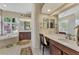Bathroom boasts a large vanity, soaking tub, and walk-in shower at 2878 Egret Ct, North Port, FL 34287